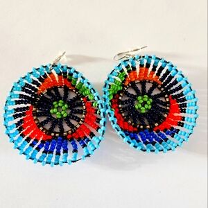 Rounded bowl shaped beaded dangly African earrings